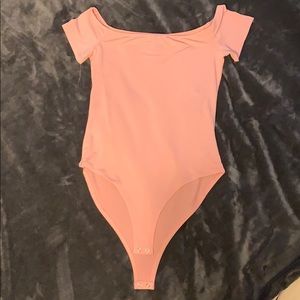 pink bodysuit